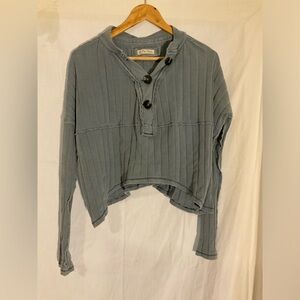 Blue Free People ribbed textured cropped sweater. So flattering
